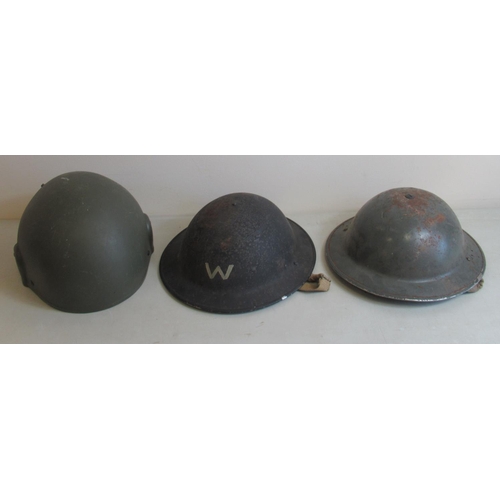 1443 - Two c1940s British steel helmets, one for an Air Raid Warden and one unmarked. Also with a British M... 