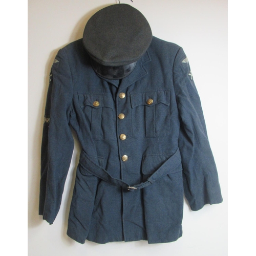 1446 - Three circa mid-20th century RAF tunics, W46-49cm, with pair of trousers and cap (4)