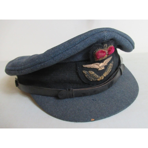 1449 - Two circa mid 20th-century RAF Navigator's tunics and trousers, dress jacket and cap, W50cm. (4)