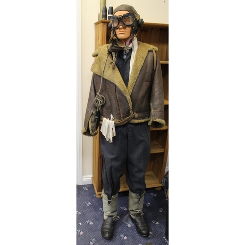 1445 - Full size (6ft) Mannequin in WWII R.A.F. Pilots flight uniform. Leather helmet with goggles, ear pho...