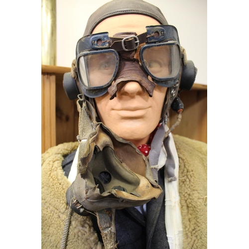 1445 - Full size (6ft) Mannequin in WWII R.A.F. Pilots flight uniform. Leather helmet with goggles, ear pho... 