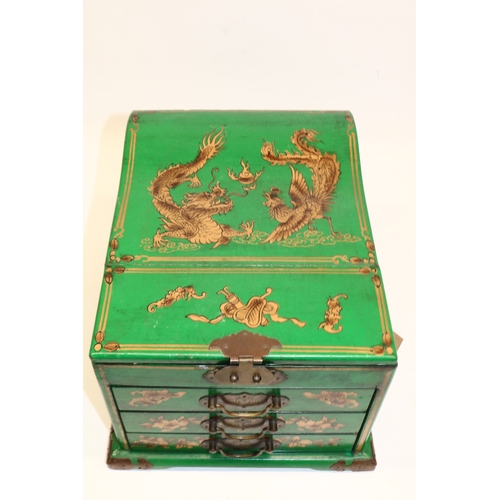 1252 - Late 20th century Chinese vanity box, green lacquer with gilt detail, H18cm W25cm D31cm