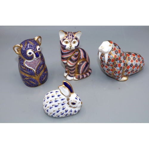 330 - Royal Crown Derby paperweights, comprising Walrus, Cat and Rabbit with gold stopper, and Koala Bear ... 