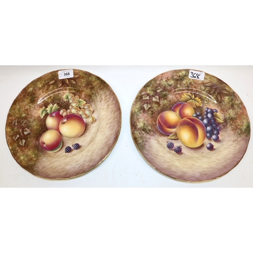 368 - Two late 20th century English Bone China plates decorated with fruit, painted by Nigel Creed, D27cm