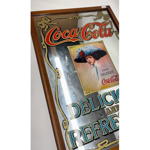 1269 - Large reproduction Coca-Cola 'Delicious and refreshing' advertising mirror, 92cm x 61cm