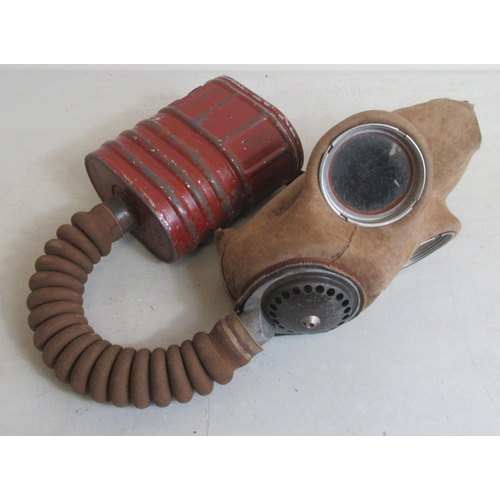 1441 - RAF Mk 3 firefighter helmet and two 20th century gas masks. (3)