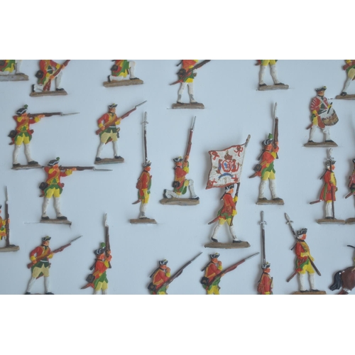 74 - Collection of thirteen framed hand painted alloy flat mostly soldier figures/figure sets to include ... 