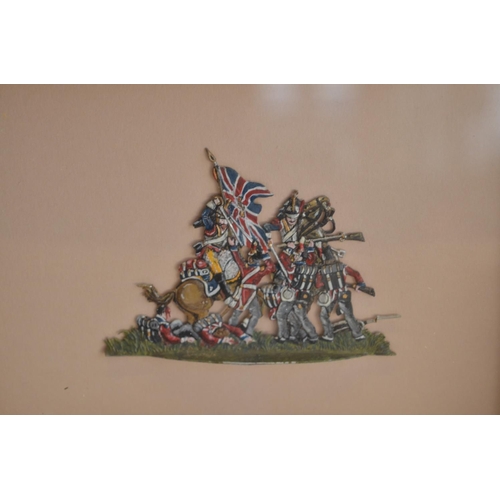 74 - Collection of thirteen framed hand painted alloy flat mostly soldier figures/figure sets to include ... 