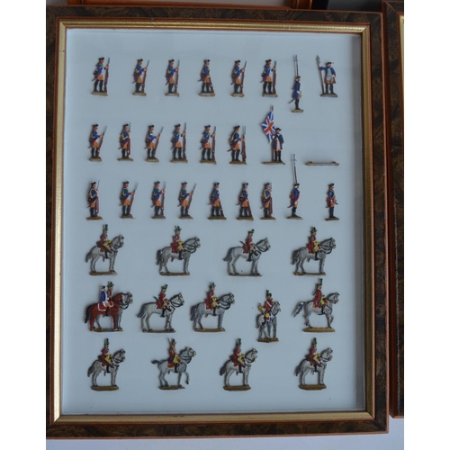 74 - Collection of thirteen framed hand painted alloy flat mostly soldier figures/figure sets to include ... 