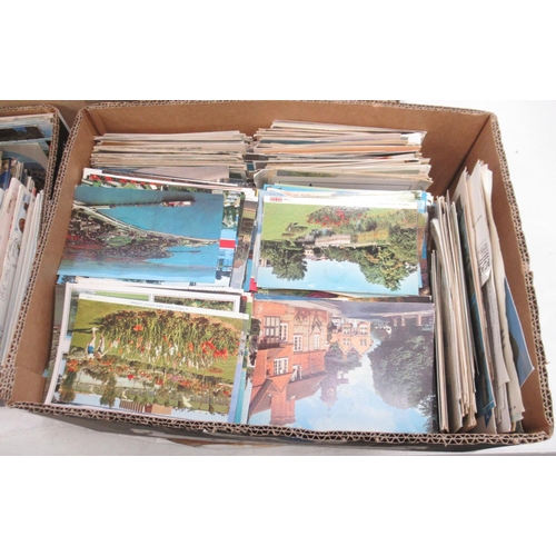 211 - Large collection of mixed c20th Postcards of Britain, Europe, etc. in 4 boxes a box of cigarette car... 