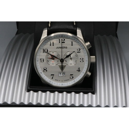 245 - Junkers stainless steel quartz chronograph wristwatch with date, signed dial, two subsidiary dials, ... 