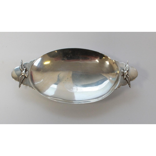 1412 - 20th C silver Tiffany & Co dish, twin handled in oval form, with the RAF albatross cast in relief on... 