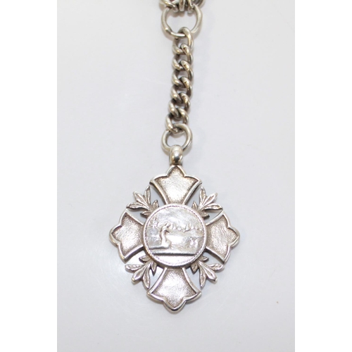 1414 - Silver enamelled award fob, engraved 'George Graham B.&D.C.C.A 1920' on a silver albert chain, silve... 