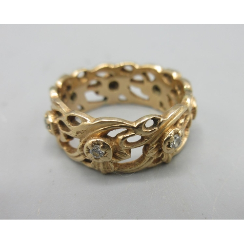 23 - 14ct rose gold openwork foliage detail ring, set with diamonds, size O1/2, stamped 585, 6.7g