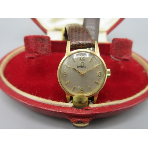 290 - Omega ladies 9ct gold wristwatch, signed brushed silvered dial, baton indices, signed snap on case b... 