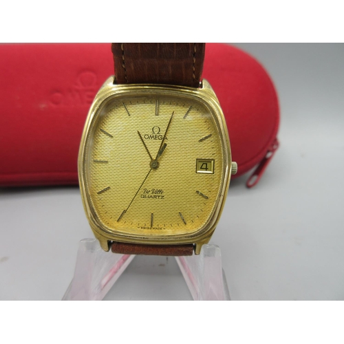 294 - Omega De Ville gold plated  quartz wristwatch with date on leather strap, signed textured champagne ... 