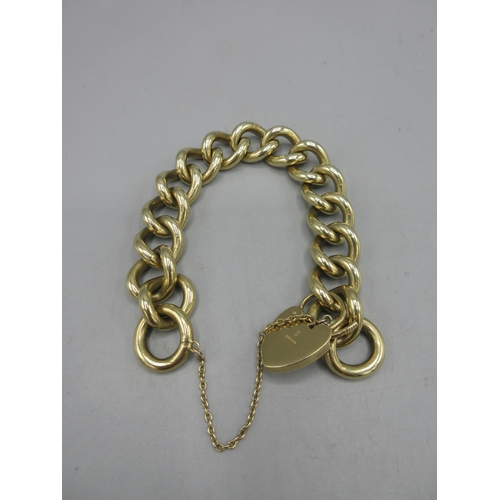 790 - 9ct yellow gold heavy chain link bracelet with ornate heart padlock closure, stamped 375, 81.8g