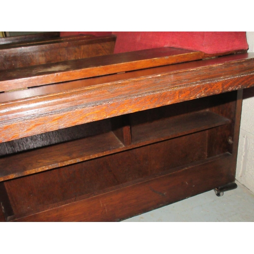 700 - Pair of 20th century Heals style oak library arm chairs with bookshelf and fold out tray sides and l... 