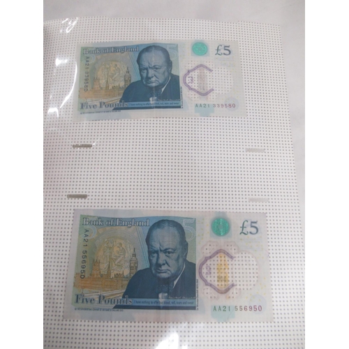 381 - Folder cont. 55 Polymer £5 banknotes to inc. serial no. AK47, AK48, AA01, etc.