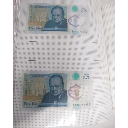 381 - Folder cont. 55 Polymer £5 banknotes to inc. serial no. AK47, AK48, AA01, etc.