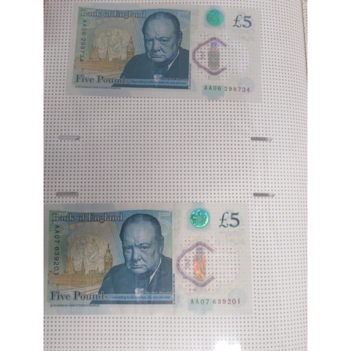 381 - Folder cont. 55 Polymer £5 banknotes to inc. serial no. AK47, AK48, AA01, etc.