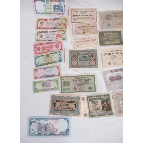 696 - Collection of International banknotes from Afghanistan, Russia, Egypt, Iraq, Portugal, etc.