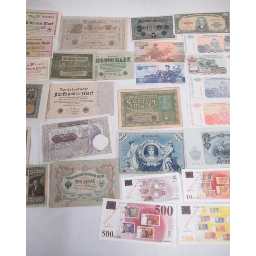 696 - Collection of International banknotes from Afghanistan, Russia, Egypt, Iraq, Portugal, etc.