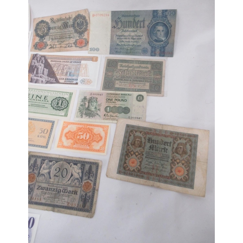 696 - Collection of International banknotes from Afghanistan, Russia, Egypt, Iraq, Portugal, etc.