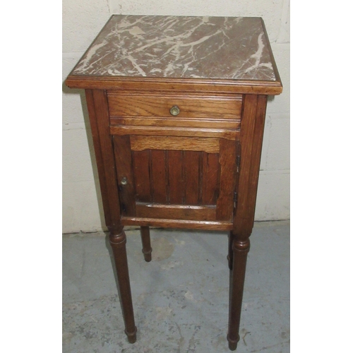 1221 - 20th century French oak bedside cabinet, inset marble top above drawer and door on turned supports, ... 