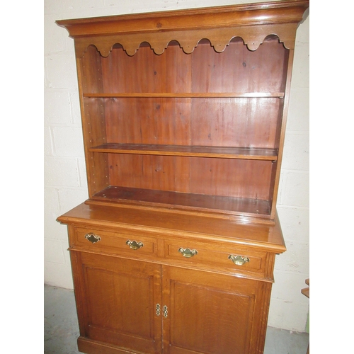 1225 - Edwardian golden oak dresser, twin shelf back above two drawers and two doors, on plinth base, WS120... 