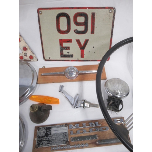 372 - Collection of automobilia to inc. 2 Morris Minor steering wheels, Morris Minor Badges, hood ornament... 