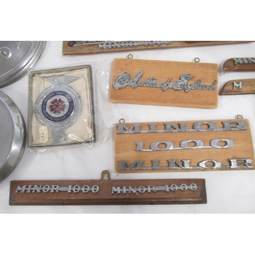 372 - Collection of automobilia to inc. 2 Morris Minor steering wheels, Morris Minor Badges, hood ornament... 