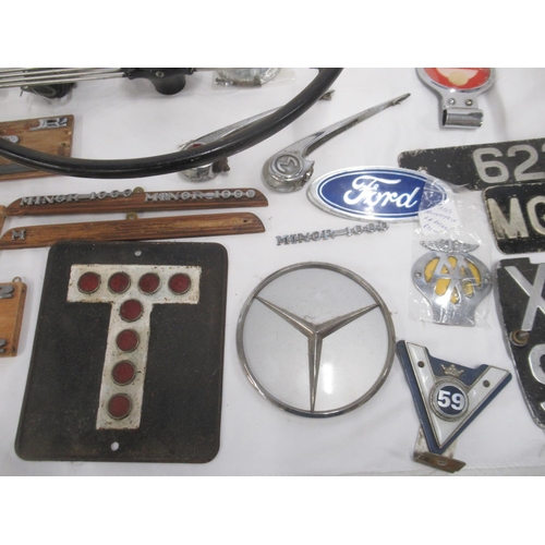 372 - Collection of automobilia to inc. 2 Morris Minor steering wheels, Morris Minor Badges, hood ornament... 