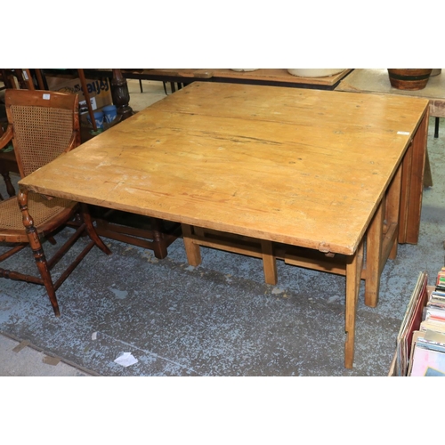 450 - 20th century narrow pine drop leaf double gate leg table. W105cm