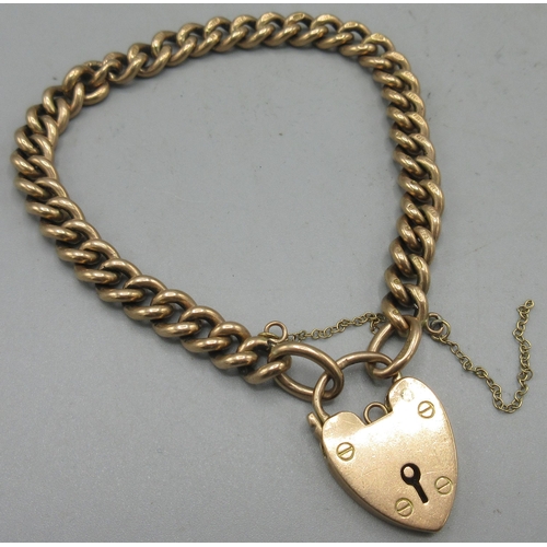 146 - 9ct rose gold cuban link chain bracelet with heart padlock closure, safety chain broken, stamped 375... 