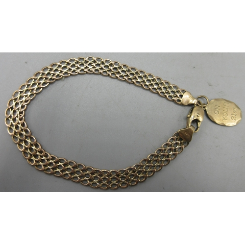 167 - 9ct yellow gold three layer chain link bracelet with gold charm engraved 'On your 21st love from Sha... 