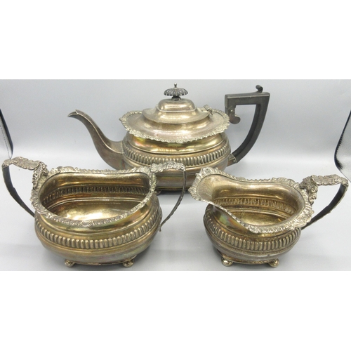 211 - Three piece Edwardian silver tea service to include teapot, twin handled sugar bowl and milk jug, ea...