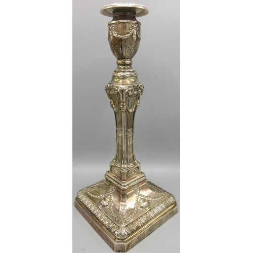 650 - Pair of 20th C silver candlesticks with gadrooned sconces decorated with ribbon swags above square t... 