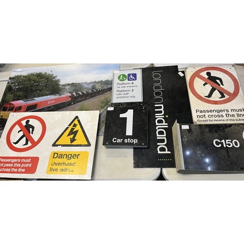 621 - Two metal Railway warning signs, two Car Stop signs, an Information sign, a London Midland sign and ... 