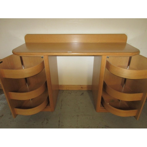 1327 - Group of Hulsta light oak bedroom furniture comprising - kneehole dressing table with bow end cupboa... 