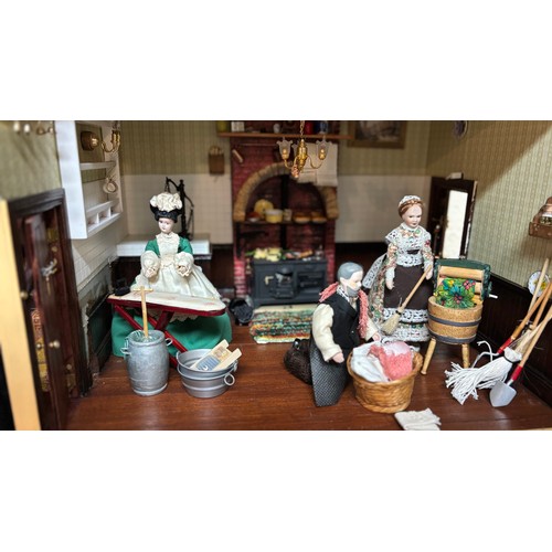 809 - Large late 20th century town house style dolls house, extensively furnished and with a quantity of d... 