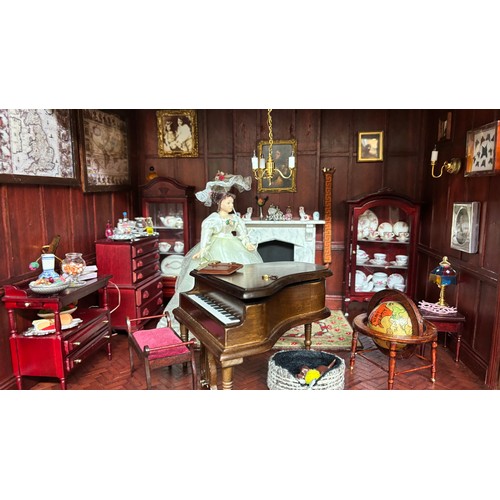 809 - Large late 20th century town house style dolls house, extensively furnished and with a quantity of d... 