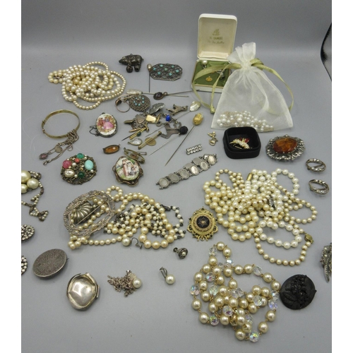 155 - Collection of costume jewellery to include pearl necklaces, screw back earrings, a trio of broches s... 