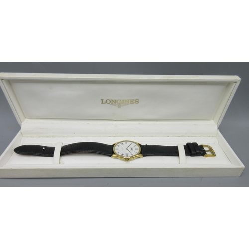 62 - Longines gold plated quartz wristwatch with date on original leather strap and matching buckle, sign... 