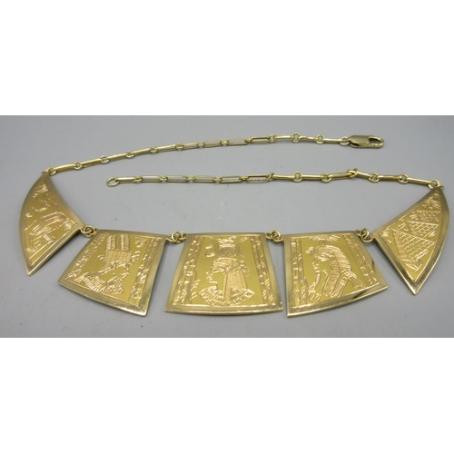 65 - 9ct yellow gold Ancient Egyptian style panel necklace, stamped 375 to clasp, 32.3g