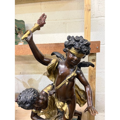 662 - After Auguste Moreau, a hollow bronze sculpture, of a blindfolded cherub and a girl, H59.5cm