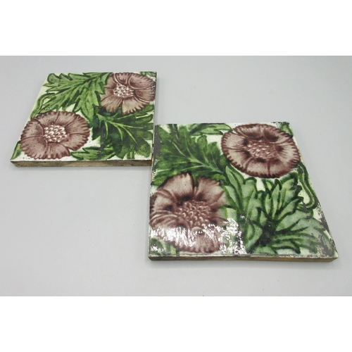 651 - Pair of William de Morgan, Merton Abbey period square tiles with pink anemone design on a cream grou... 