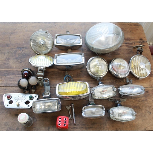 374 - Collection of vintage car lights. Rear lights, fog lights, Small wing lights, reversing lights, Made... 