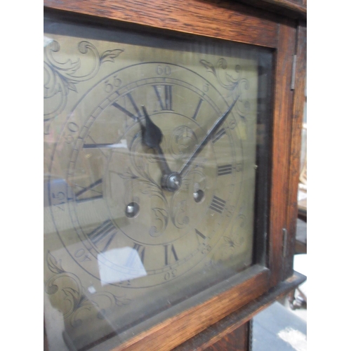 423 - Small 20th century oak long case clock, with square brass Roman dial, twin train movement striking o... 