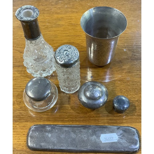 182 - Three hallmarked silver top glass dressing table items, two similar tops, a brush back and a tumbler... 